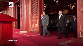 China displays its weapons in military parade attended by Putin, Kim Jong