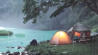 Tranquil Camping in a Tent by a Waterfall