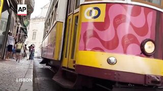Tourists in Lisbon undeterred by streetcar crash that killed 16
