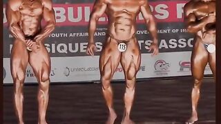 Olympia. Bodybuilders show off their bodies.