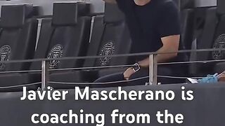 Mascherano is coaching from the stands