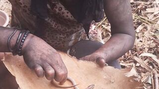 Primitive people eat eels in nature