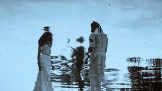 reflection of couple in water
