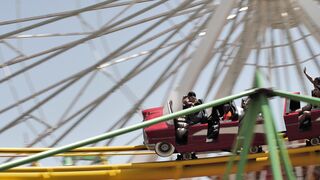 People on Roller Coaster