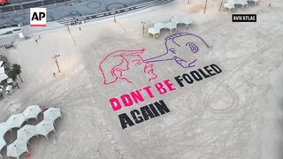 Israeli activists draw portraits of Netanyahu and Trump on beach ahead of