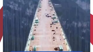 Cina Resmikan Jembatan Huajiang Grand Canyon, Tertinggi di Dunia di Atas Sungai Beipan