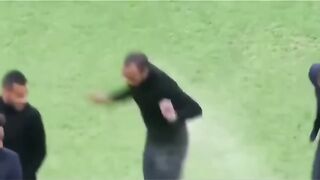 Epic Footballers Leap and Score an Unforgettable Goal on the Field!