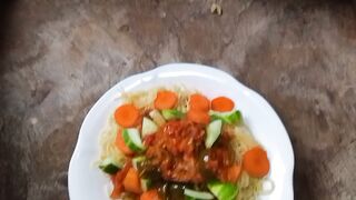A delicious spatthegetti with a vegetables stew