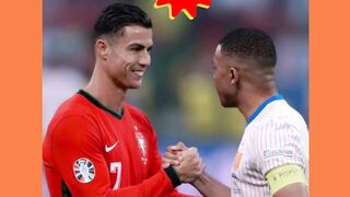 Two football players, one in a Portugal jersey and the other in a France jersey, shake hands on the field