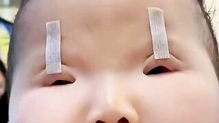 Why do Chinese parents tape their childrens eyes?