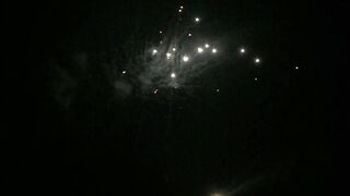Aerial Fireworks Illuminating The darkness Of The Night