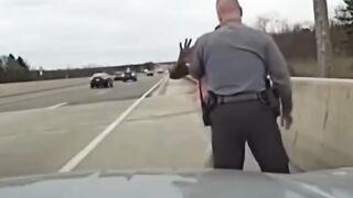 A shocking scene unfolds as a suspect attacks an Ohio State Trooper, steals his cruiser, and leads police on a wild chase before crashing.