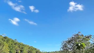 go for a ride on a motorbike while enjoying the scenery around the road