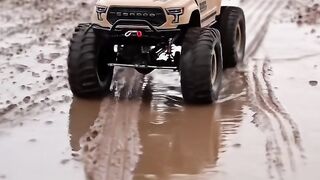 Extreme Off-Road Action! Big RC Truck Conquers Mud and Puddles