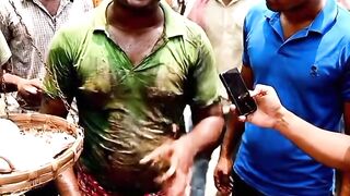 Only in India! Vendor Casually Cleaning a Real Snake