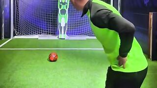 The best footballers try to score against a robot goalkeeper!