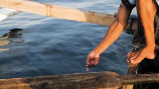 Someone pulled out a fishing line and caught a fish.