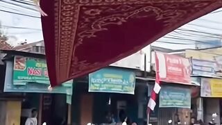 Grandpa Flying on a Carpet in the Middle of the Street!