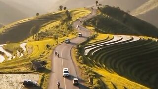 Scenic Road Through Terraced Rice Fields of Pangalengan with Majestic Mountain View