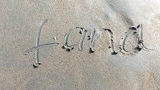 sea wave and sand writting in sand