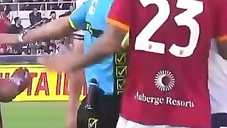 Dybala shows Guendouzi his shin pad of the Argentine lifting the World Cup trophy