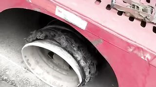 Highway rescue replacing a tire for a car carrier truck
