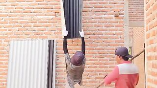 Wow. really creative.!!! This senior builder made a tool to lift zinc roofs up.
