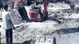 Excavator tries to dance ballet.
