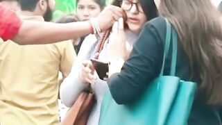 Pulling cheek of cute girls