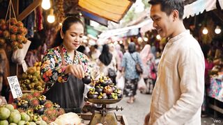 Another person buys fruit and the ladies sell it