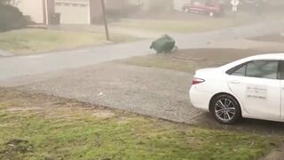 man records moment tornado pinned him to front door