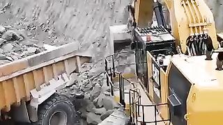 CAT 6015 B Loading Dump Truck Powerful  Efficient Performance!