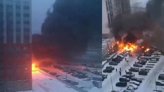 A container with diesel fuel and several cars are burning on Borys Pasternak Street in Russia