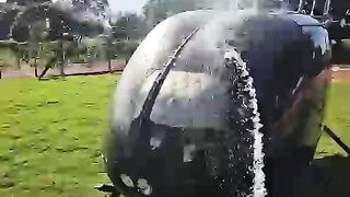 Washing a Helicopter on a Day Off