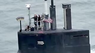 Where does the smoke from the submarine go when it is diving?