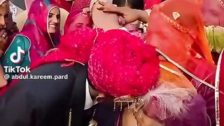 Mother in Law Feeding Milk to Son in Law