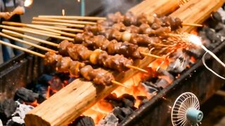 Miniature Team Arranging Giant Sate Ayam Over Charcoal