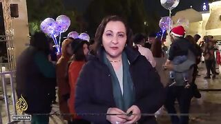 Bethlehem lights up Christmas tree amid hopes for economic recovery