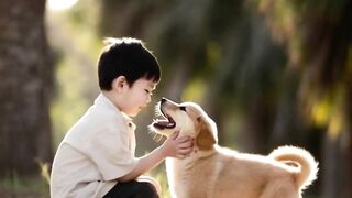 A little boy with little dog