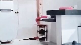 Cooking is definitely not his thing  hes going to hurt himself