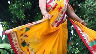 sweet girl wearing a traditional Bangladeshi saree