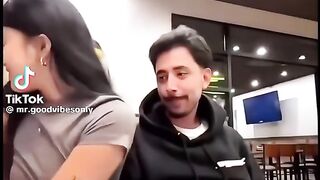 A happy marriage a wife surprising her husband with a drink