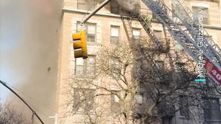 Four-alarm blaze injures three residents and a firefighter in New York