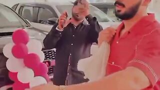 Rajab butt by a new car