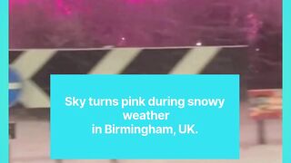 Sky turns pink during snowy  weather  in Birmingham, UK.