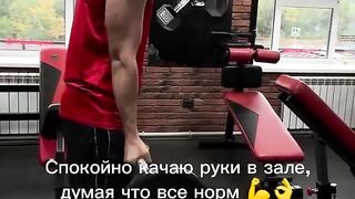 The athlete calmly shakes his hands in the gym, thinks that everything is normal