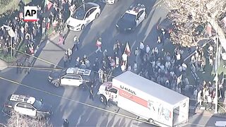 Scene in LA after U-Haul truck driver speeds through crowd at anti-Iran rally.