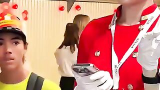 Symbolically, in a red uniform