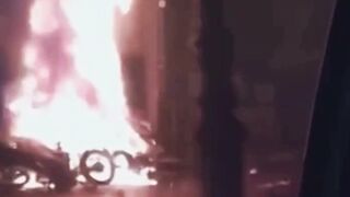 Iranian TV broadcasts footage of street fires amid night of mass protests