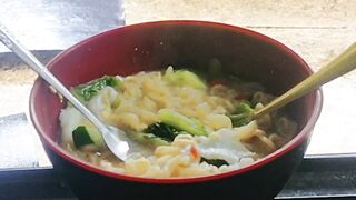 Eating noodles